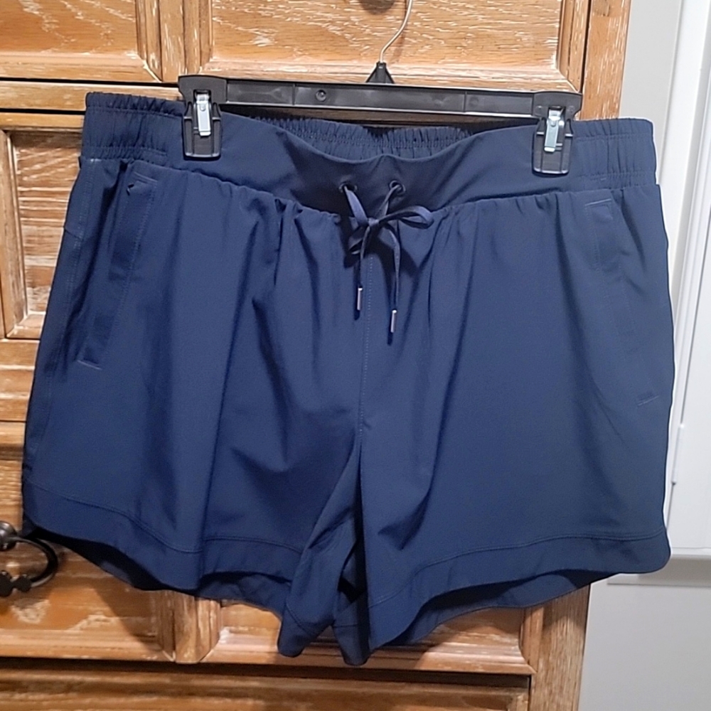 Calia By Carrie mid rise short. NWT